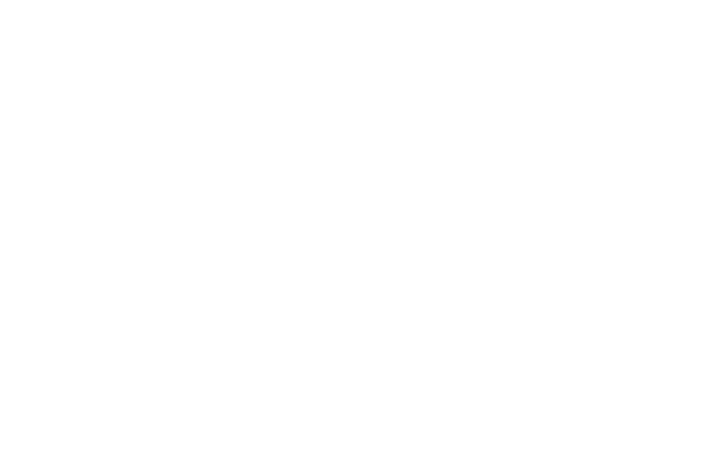 Logo of the university of tennessee featuring a white medical cross with a stylized abstract snake emblem, hinting at healthcare or medical education associated with the institution, on a black background.