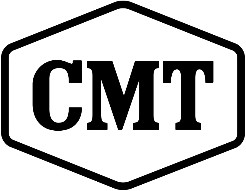Black and white hexagonal sign with the letters "cmt" prominently displayed in the center.