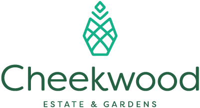 The image displays the logo of "cheekwood estate & gardens," featuring a stylized representation of a pineapple, which is a symbol of hospitality, above a geometrically patterned square that may represent a garden layout, all rendered in a soothing green hue that suggests nature and growth.