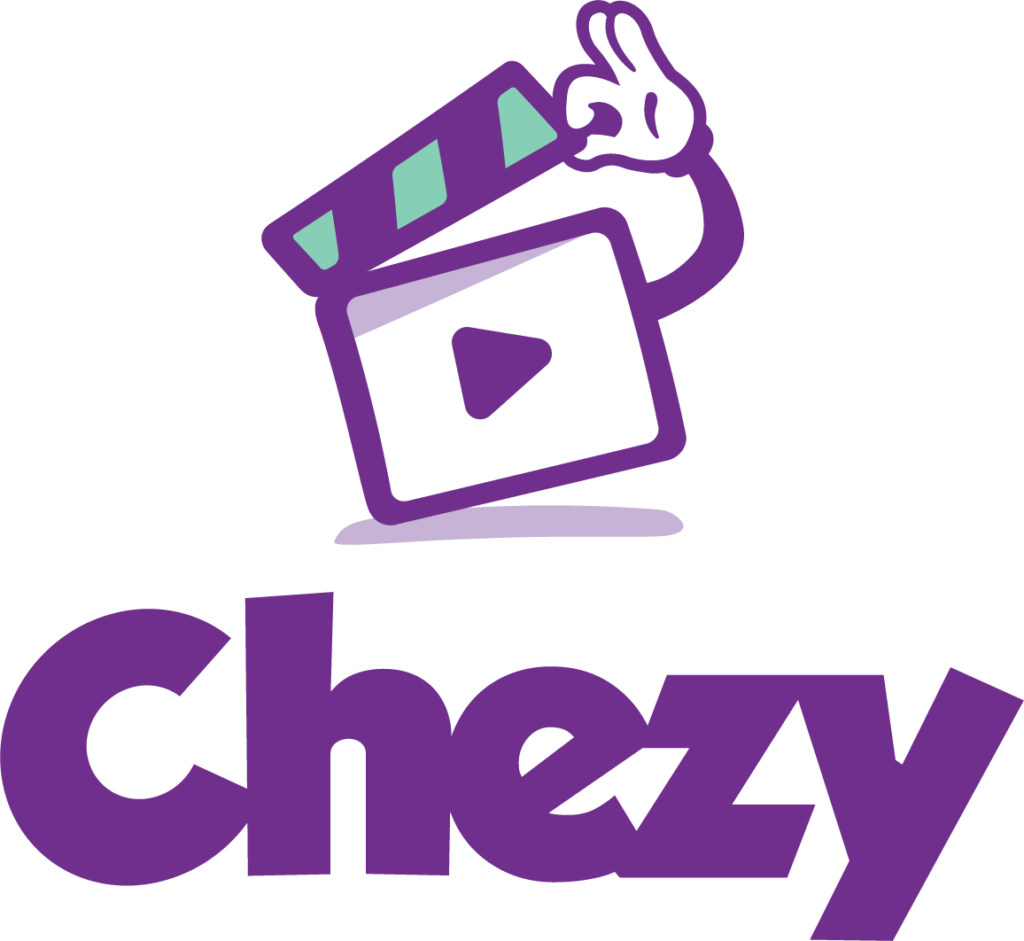 A playful logo featuring a clapperboard with a hand giving a thumbs-up gesture above it, accompanied by the stylized word "chezy" in purple.