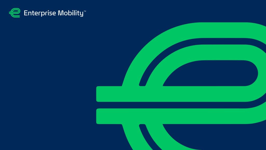 Abstract green lines forming a dynamic shape on a blue background with 'enterprise mobility+' text in the corner.