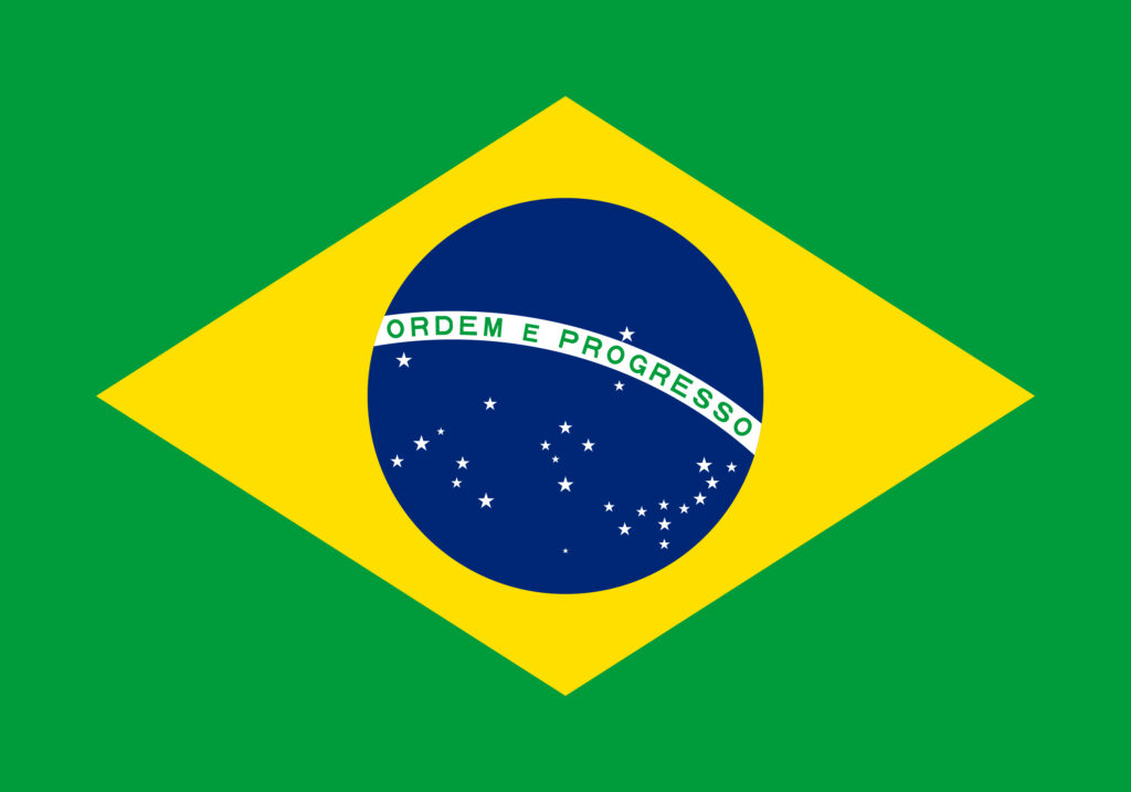 A vibrant brazilian flag, featuring a green field with a yellow rhombus in the center, inside of which is a blue circle with white stars and a white band across it bearing the national motto "ordem e progresso" (order and progress).