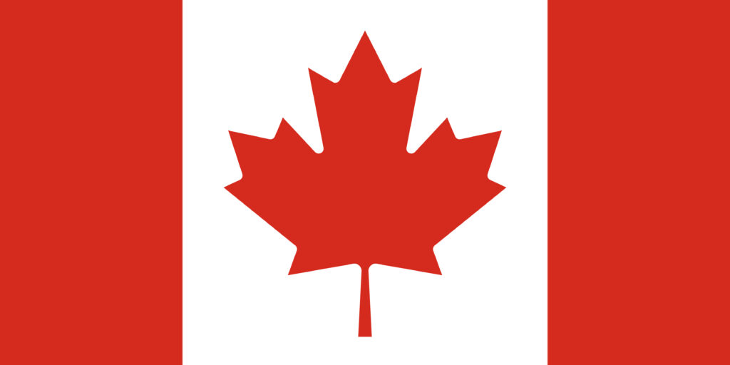 A canadian flag with a prominent red maple leaf centered between two vertical bands of red and a larger white band.