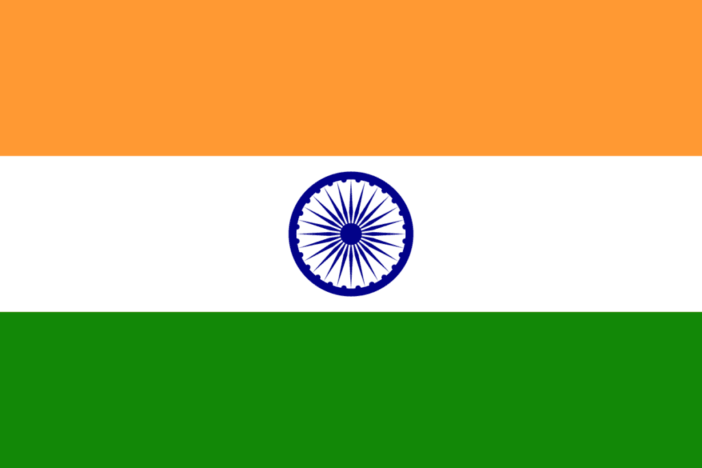 The flag of india, featuring a deep saffron (kesari) top band, a white middle band with a navy-blue wheel with 24 spokes (the ashoka chakra), and a green bottom band.