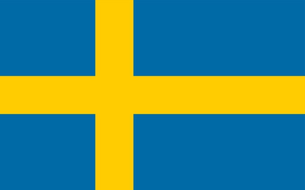 The flag of sweden, featuring a blue field with a yellow or gold scandinavian cross that extends to the edges of the flag.