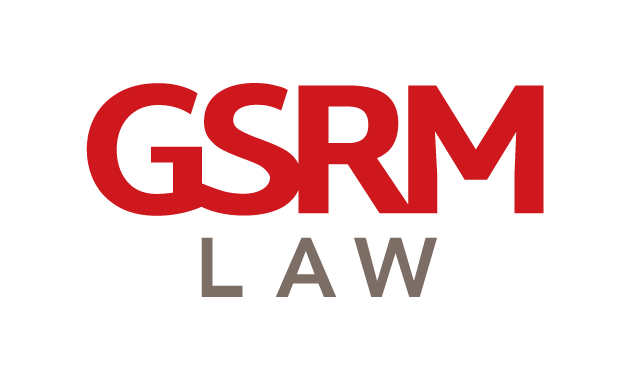The image depicts the logo for "gsrm law," which is predominantly text-based, featuring the acronym "gsrm" in bold, red, uppercase letters, followed by the word "law" in grey, capitalized font. the design is straightforward, suggesting a professional and legal entity.