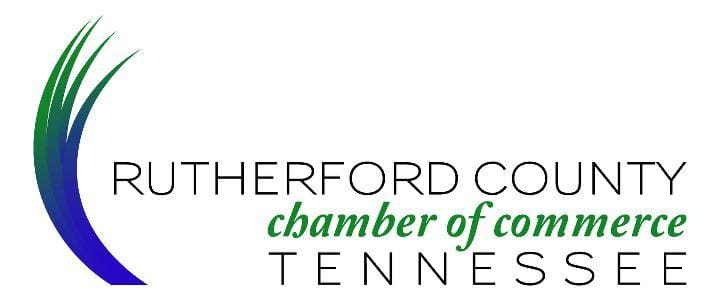 The image shows the logo of the rutherford county chamber of commerce in tennessee, which comprises a stylized graphic element with green and blue vertical lines, along with the name of the organization in black and green font.