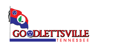 The image is a logo that includes the name "goodlettsville tennessee" in capitalized red lettering, with a graphic representation of the state of tennessee in white, featuring three stars inside a blue circle which is a nod to the tennessee state flag. the background is dark, and the graphic is encased in a partial outline resembling the state's border, highlighted in red and blue.